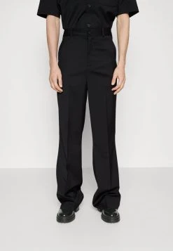FLARED TROUSERS - Stoffhose - Black